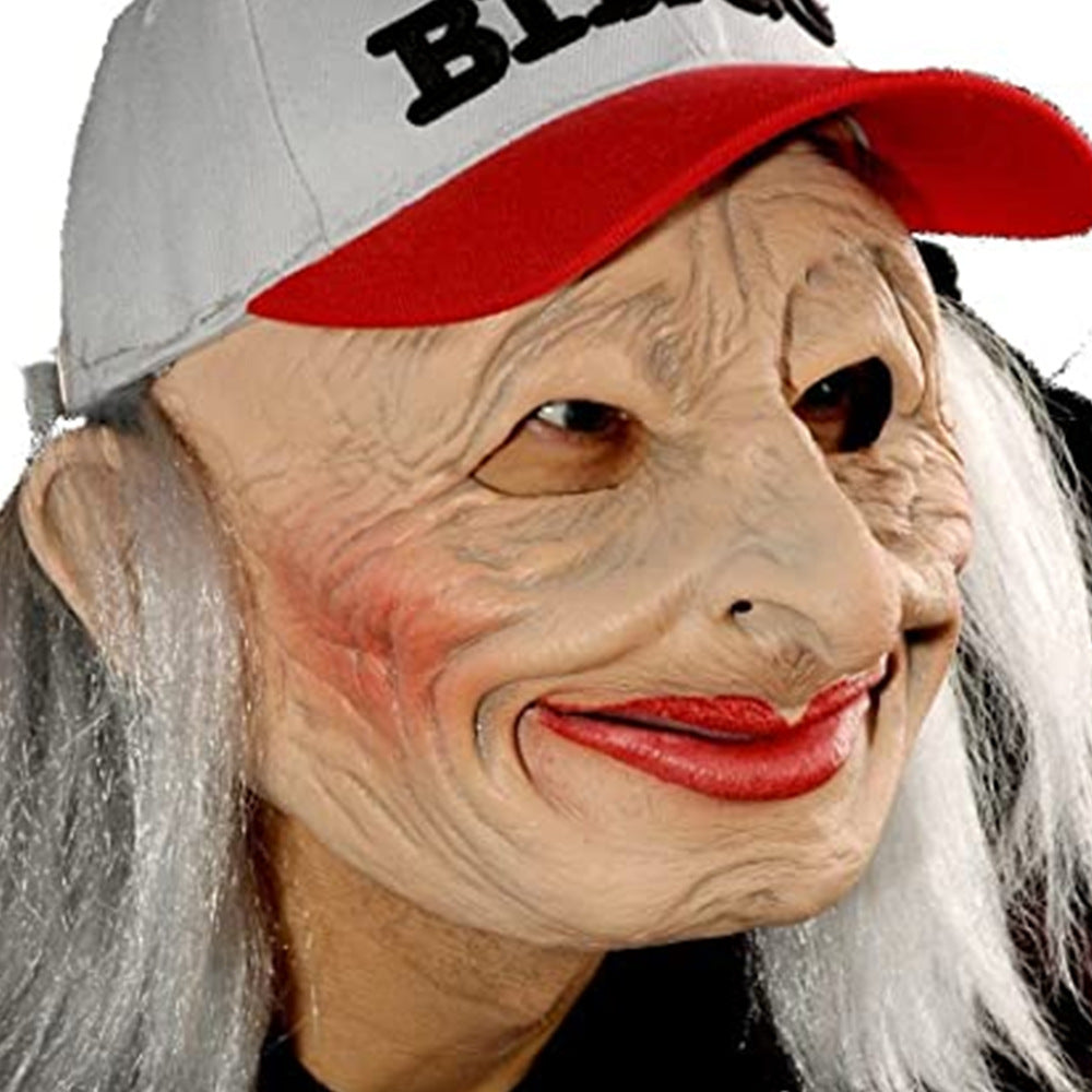 Person wearing a mask with a red cap labeled 'Black Lives Matter'.
