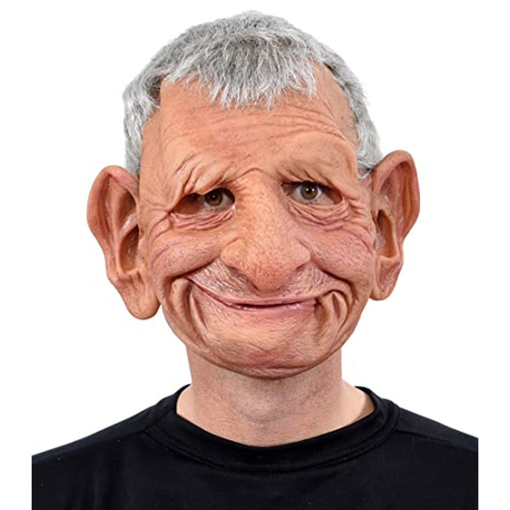 Person wearing a detailed elf mask on a white background