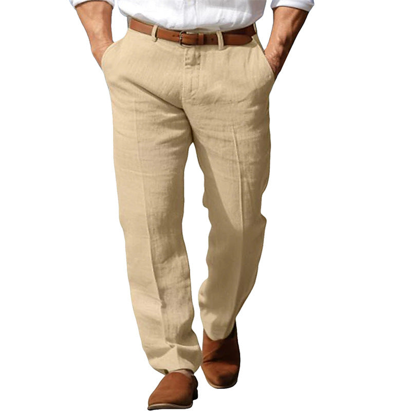 Beige pants worn by a person on a white background