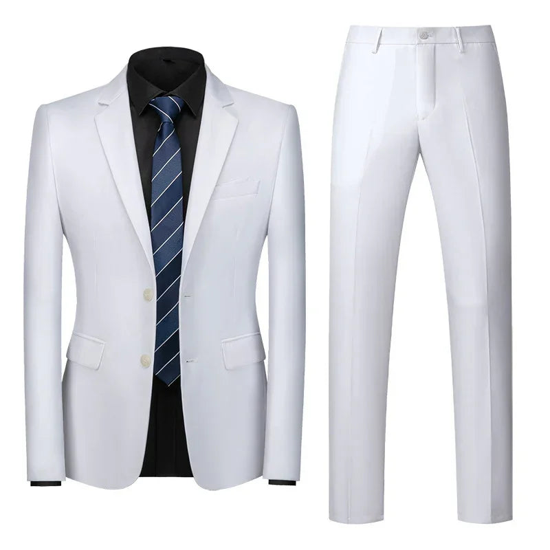 White suit jacket with black shirt and blue tie, paired with white pants on a white background