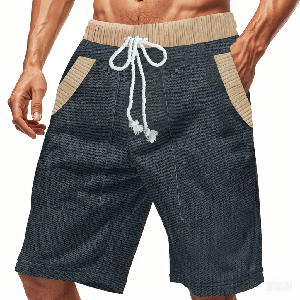 Dark gray shorts with beige accents and a white drawstring on a white background