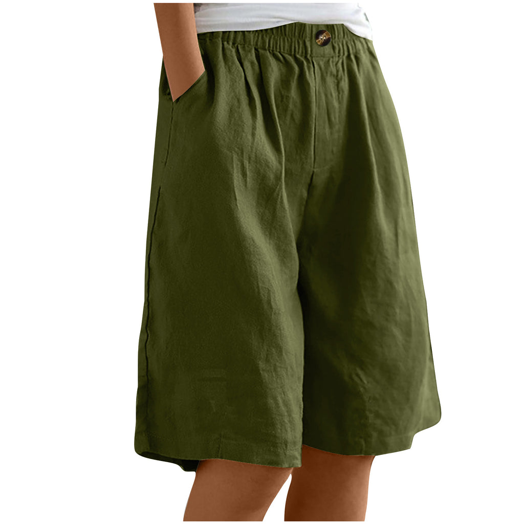 Brown shorts worn by a person on a white background