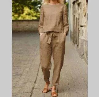 Woman wearing a beige linen pantsuit and sandals outdoors, stylish ZA-Zola fashion look