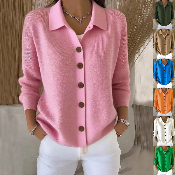 A woman wearing a pink button-front knit cardigan with a pointed collar and brown buttons, paired with white pants. A vertical strip on the right shows the same cardigan in additional color options: green, tan, blue, orange, white, and green.