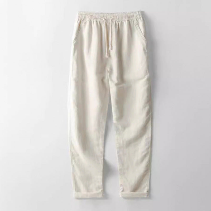Beige sweatpants on a light gray background