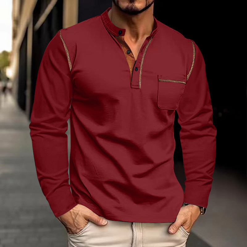 Man wearing a red long-sleeve shirt with a blurred background