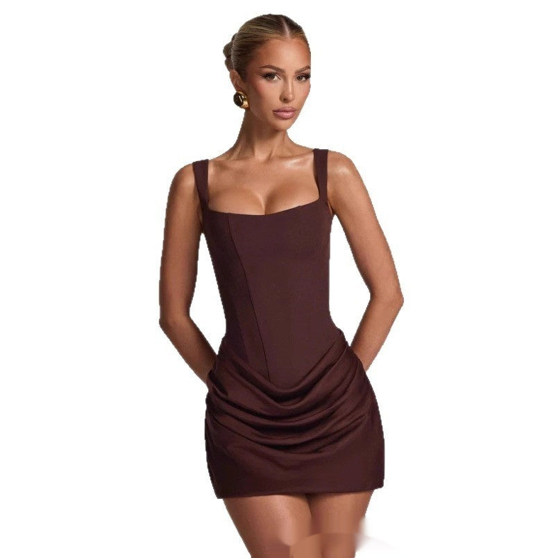 Woman wearing a brown dress on a white background