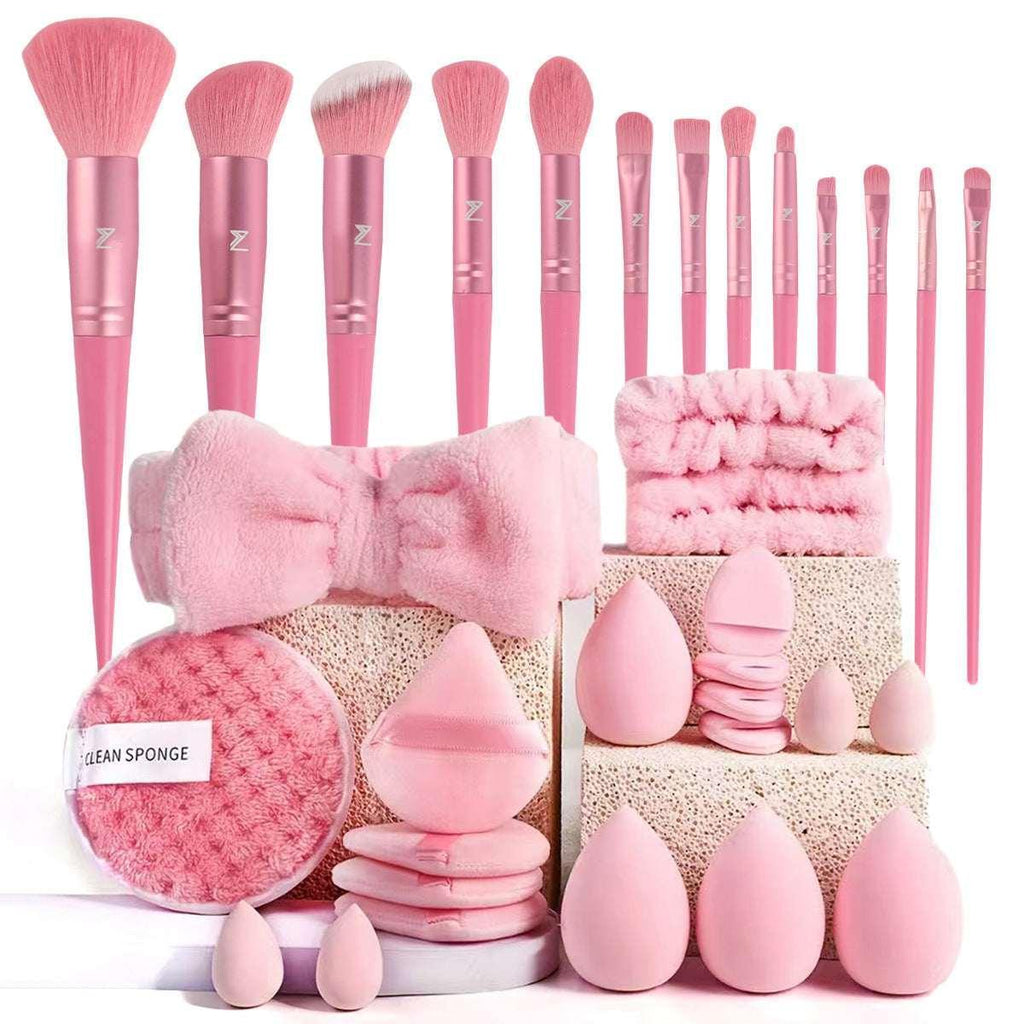 Pink makeup brush set with beauty sponges, headbands, and cleansing pads for beauty routines