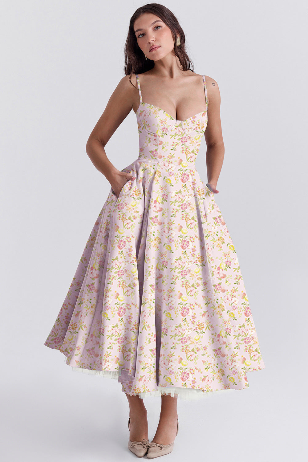 Woman wearing a floral dress on a white background