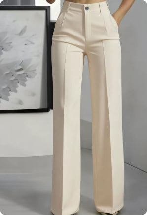 Beige pants worn by a person against a neutral background