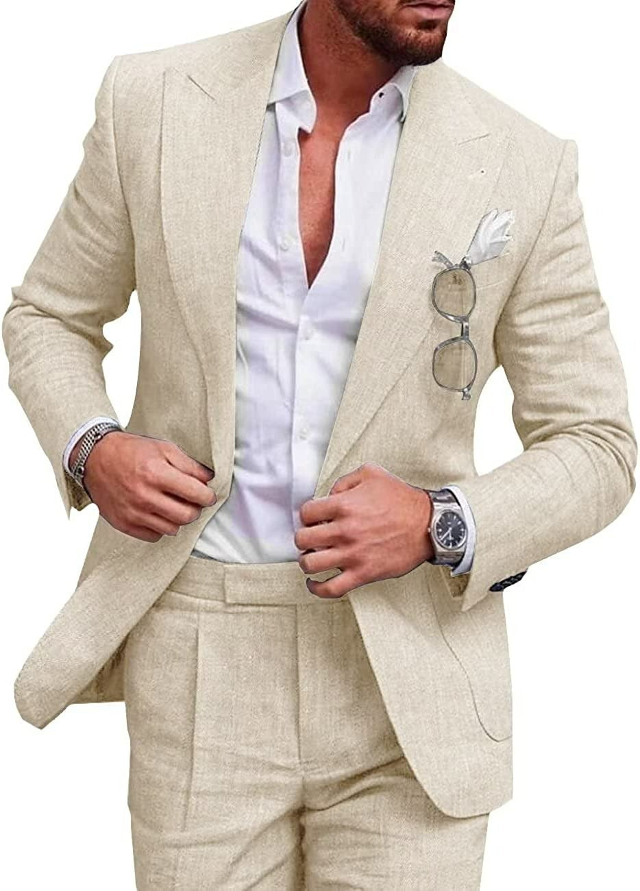 Man wearing a beige suit with a white shirt on a white background