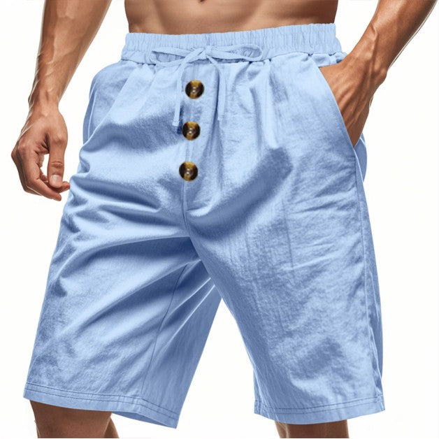 Light blue shorts with button details on a white background