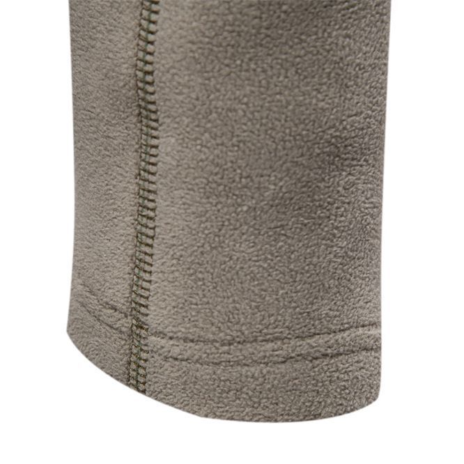 Close-up of a textured fabric with a zipper on a white background