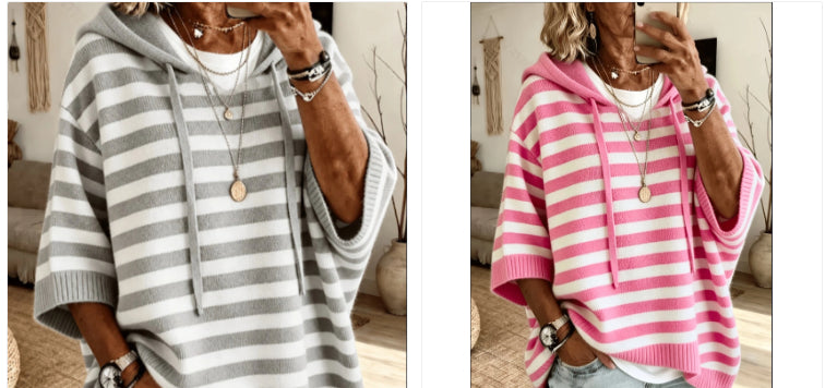 Two side-by-side views of a woman wearing a loose striped hoodie. The left view shows a gray and white striped hoodie, and the right view shows a pink and white striped hoodie.