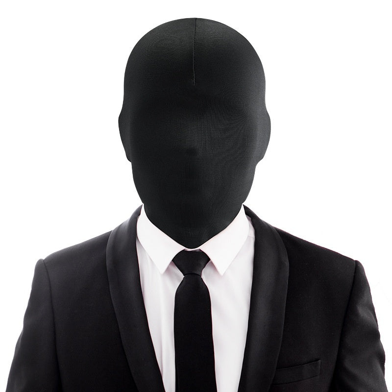 Person wearing a black suit and tie with a black face mask on a white background
