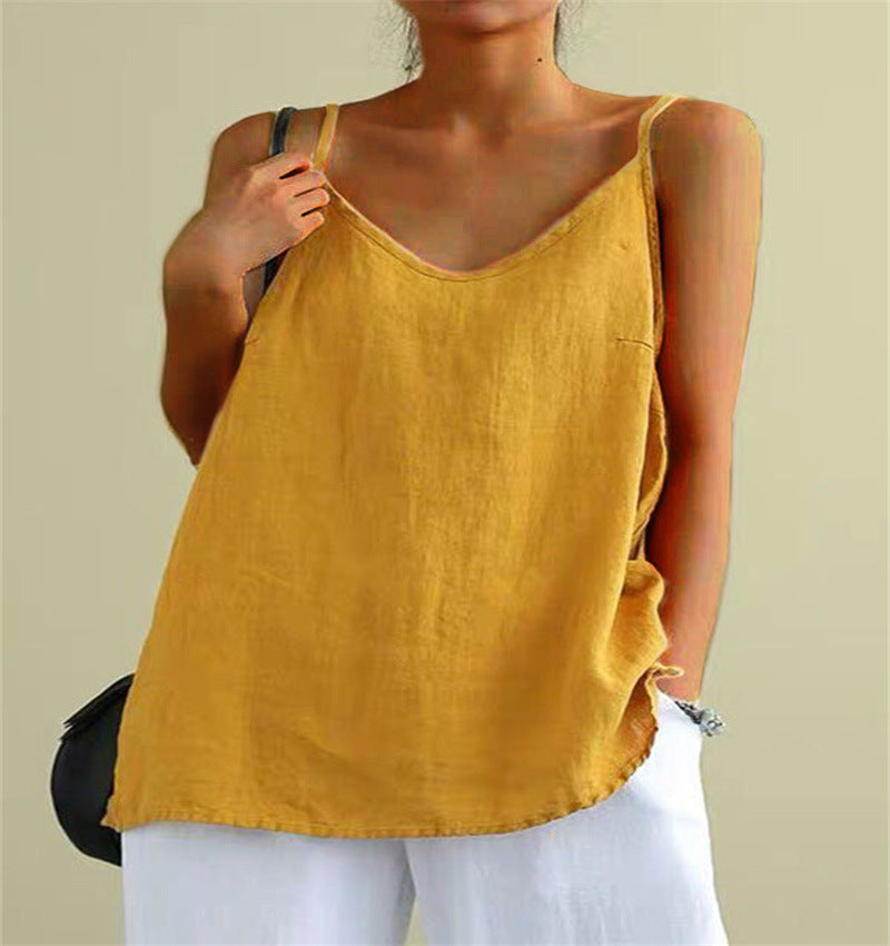 Yellow sleeveless top worn by a person on a beige background