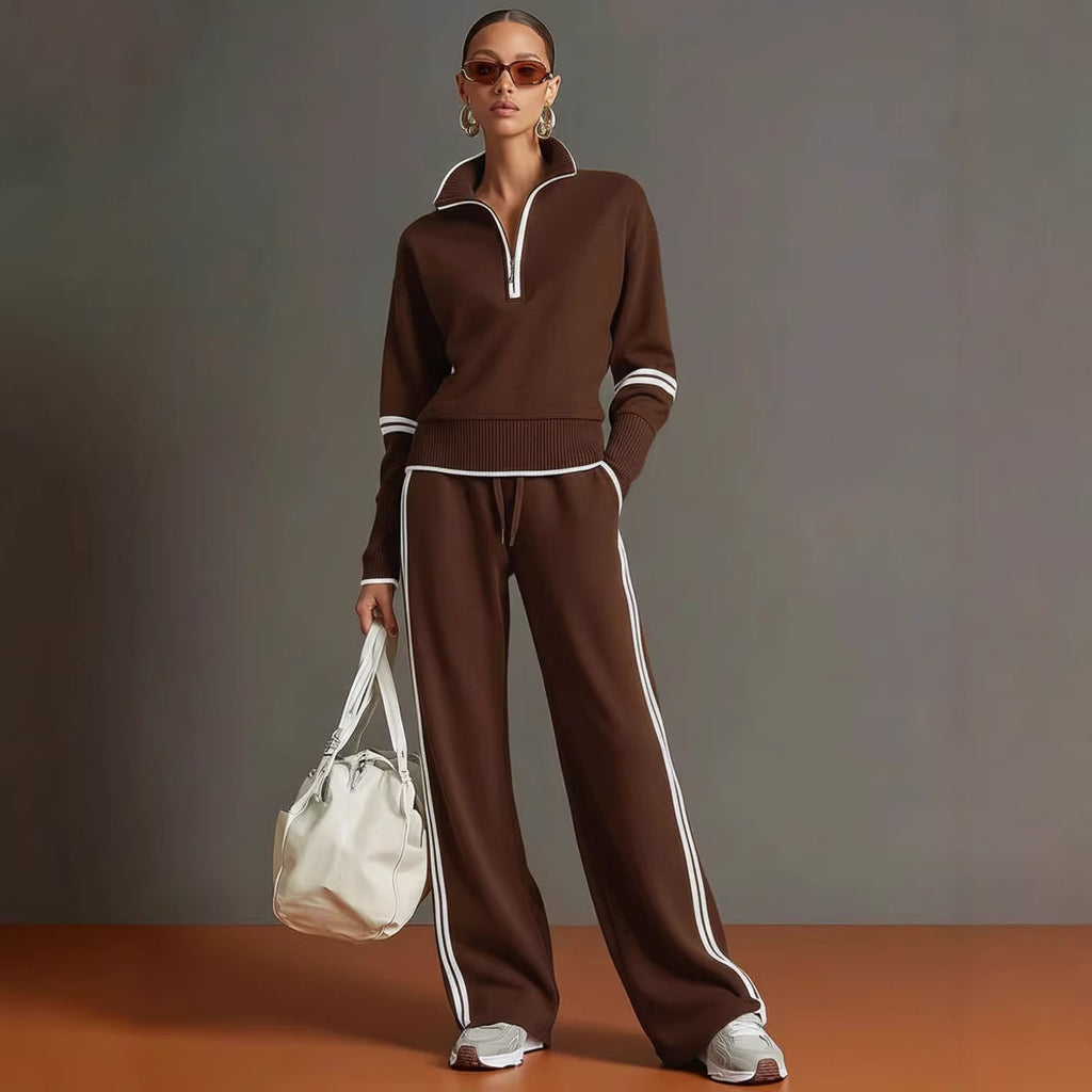 Woman wearing a brown tracksuit with white stripes on a gradient background