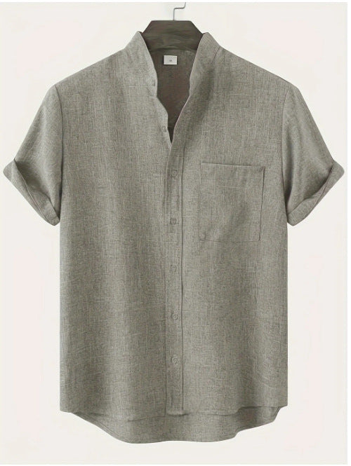 Gray short-sleeve shirt on a hanger against a white background
