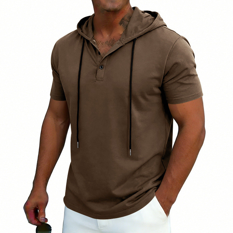 Man wearing a brown short-sleeve hoodie on a white background