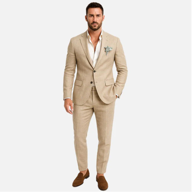 Man wearing a beige suit with a white shirt on a white background