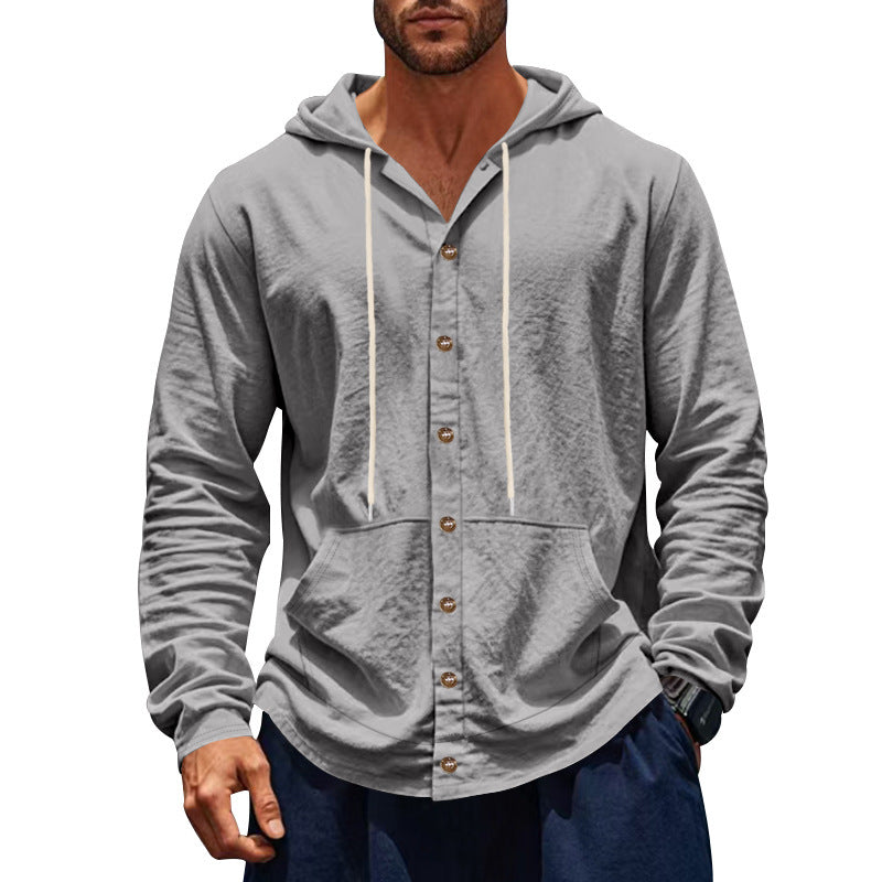 Man wearing a gray hoodie with button details on a white background