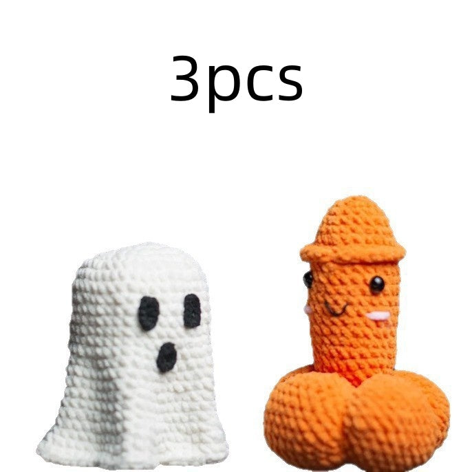 Two small crocheted novelty toys on a white background with the text '3pcs' above them: a white ghost figure with black eyes and mouth, and an orange phallus-shaped figure wearing an orange hat with a simple face.