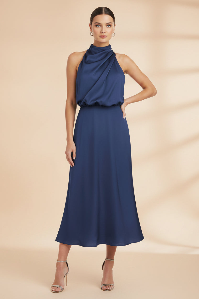 Navy blue halter neck dress on a white background