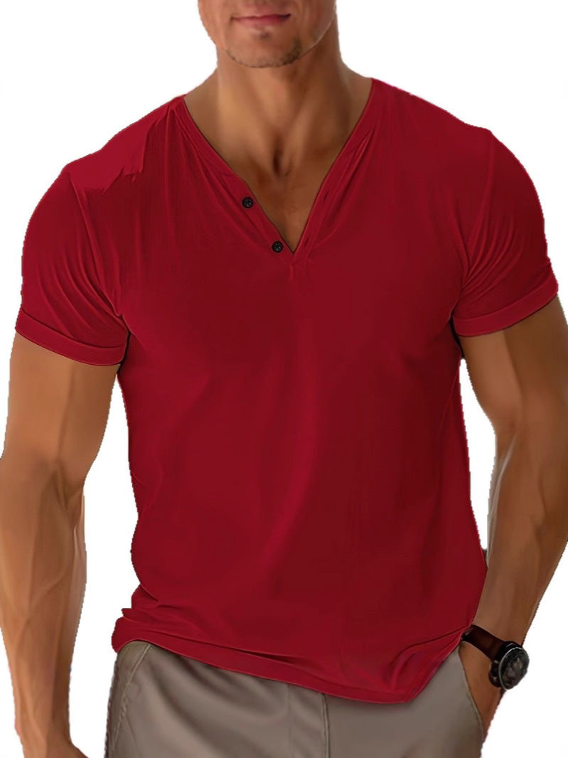 Man wearing a red V-neck shirt on a white background
