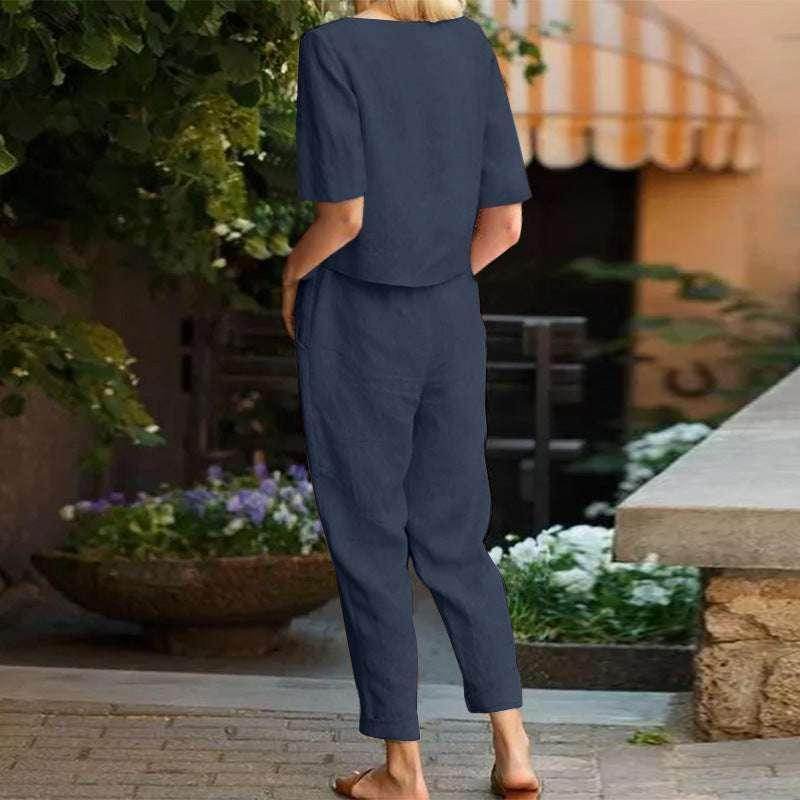 Woman in navy blue jumpsuit standing outdoors, ZA-Zola trendy fashion apparel
