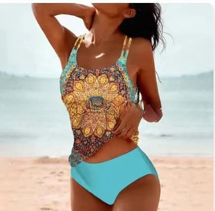 Woman wearing a colorful patterned swimsuit on a beach