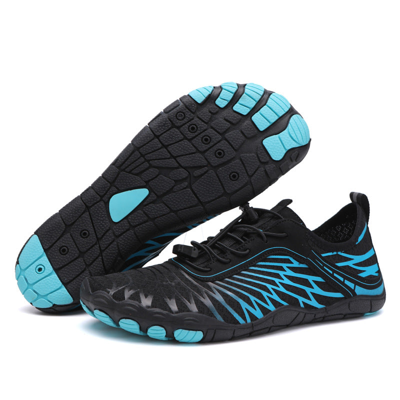 Black and blue athletic shoes on a white background