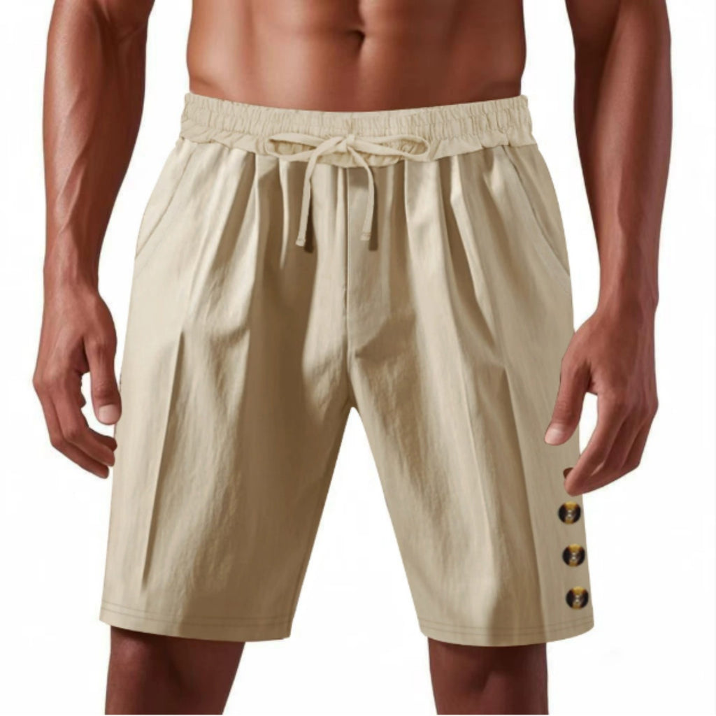 Beige shorts with button details on a white background