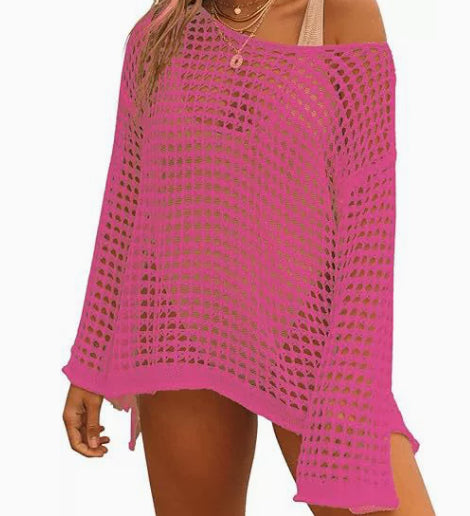 Pink crochet cover-up on a white background