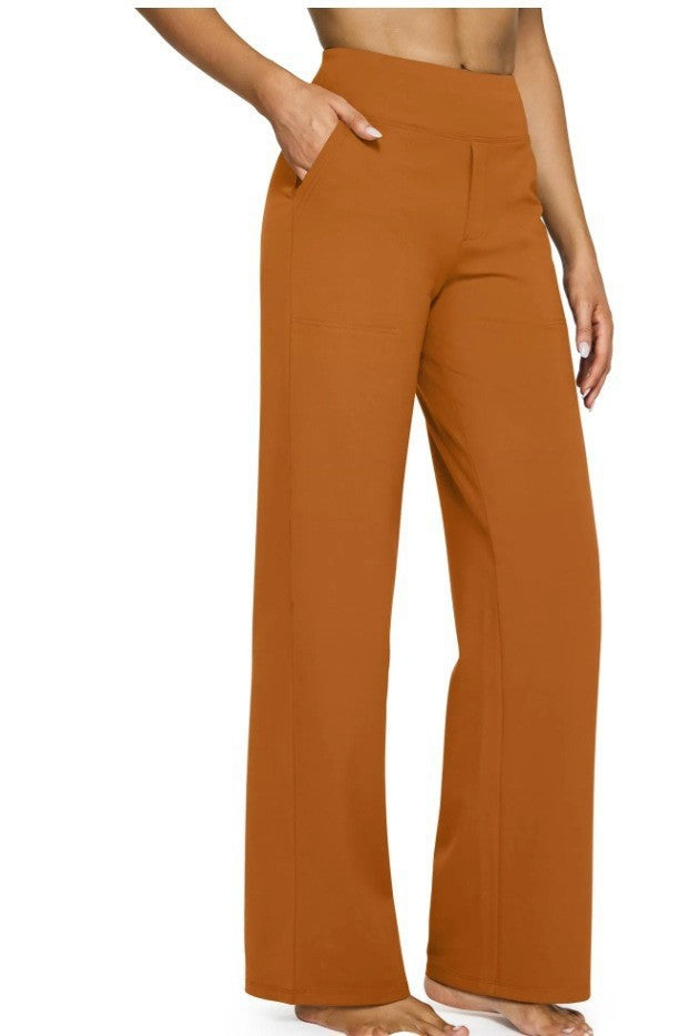 Orange wide-leg pants worn by a person on a white background