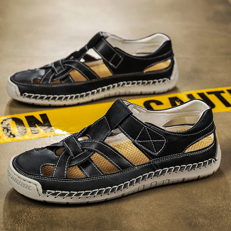 Black sandals with white soles on a brown surface with yellow caution tape.