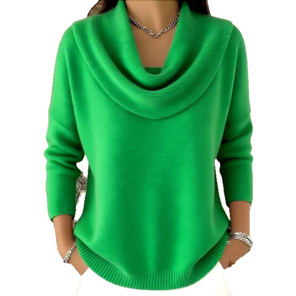 Green cowl-neck sweater worn by a person on a white background