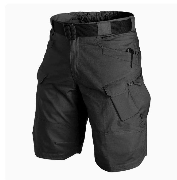 Black tactical shorts with multiple pockets and a belt on a white background