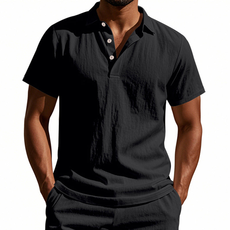 Man wearing a black short-sleeve shirt on a white background
