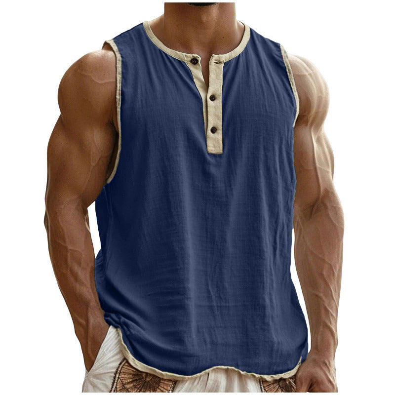 Blue sleeveless shirt with beige trim worn by a person on a white background
