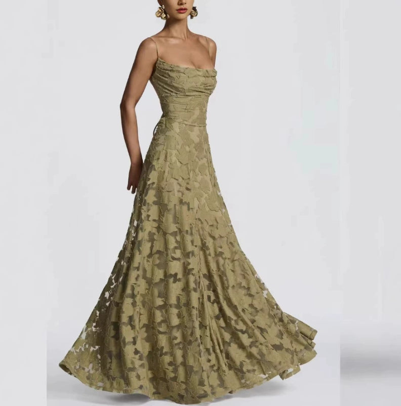 Woman wearing a green strapless gown on a white background