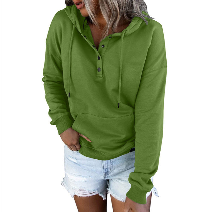 Green hoodie worn by a person on a white background