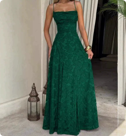 Green lace dress worn by a person in an indoor setting