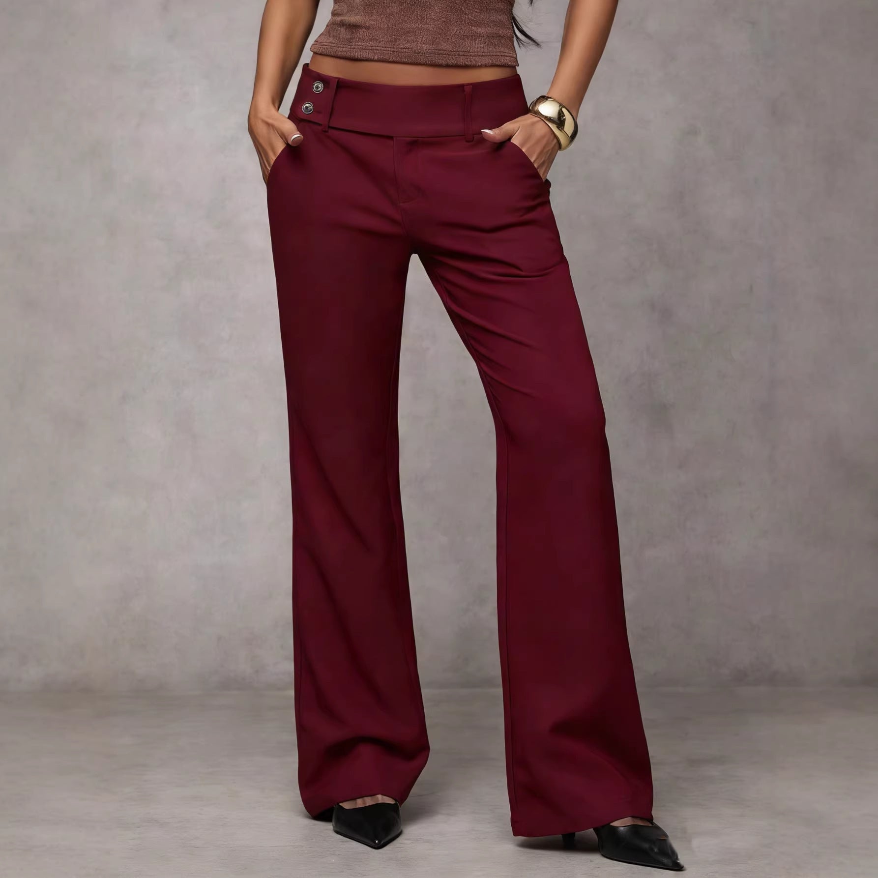 Maroon wide-leg pants worn by a person on a plain background