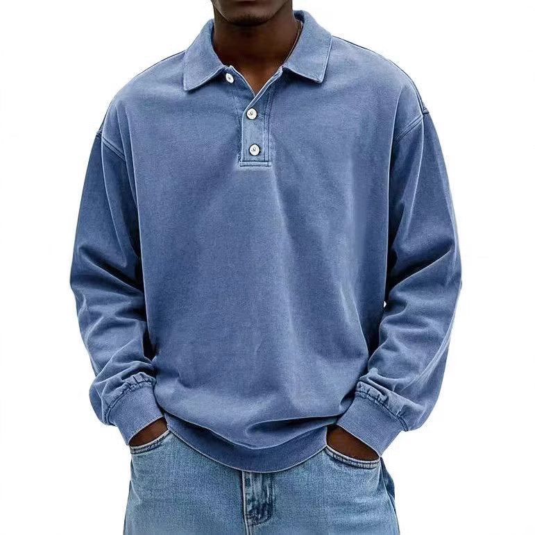 Person wearing a blue long-sleeve polo shirt on a white background