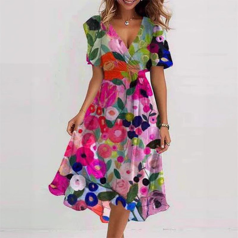 Woman wearing a colorful floral dress on a white background