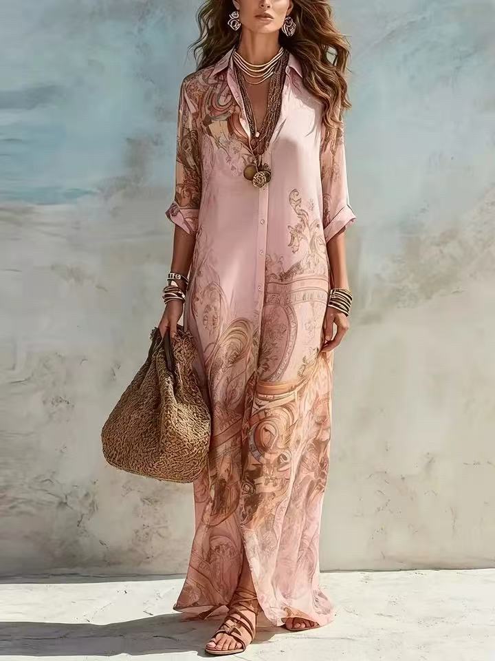 Woman wearing a pink patterned outfit with a textured wall background