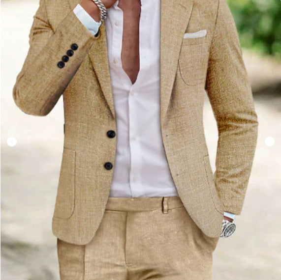 Beige suit jacket and pants with a white shirt, blurred background