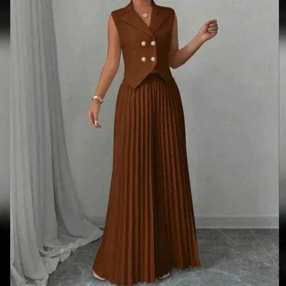 Woman in a brown sleeveless pleated jumpsuit with gold buttons, chic ZA-Zola fashion style