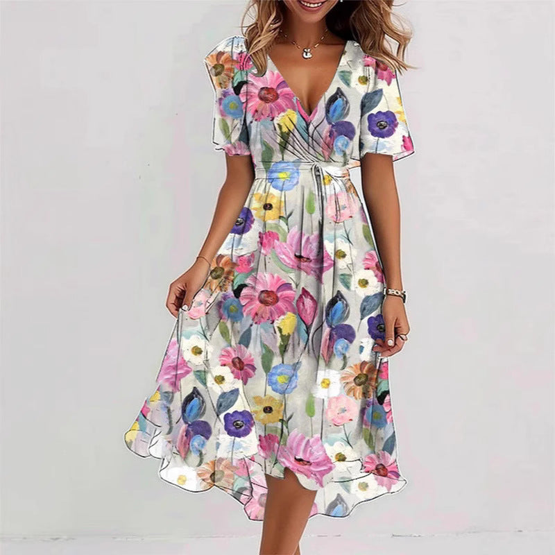 Woman wearing a colorful floral dress on a white background