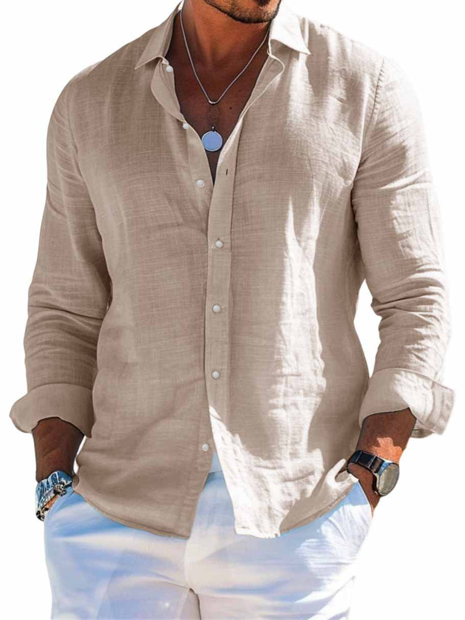 Man wearing a beige button-up shirt with rolled-up sleeves on a white background